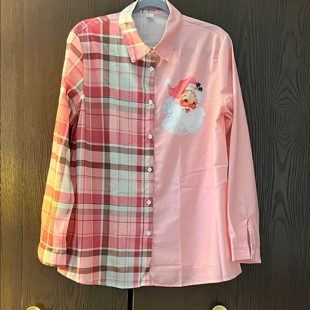 No brand pink Santa Claus blouse. Size Large. New in the bag.